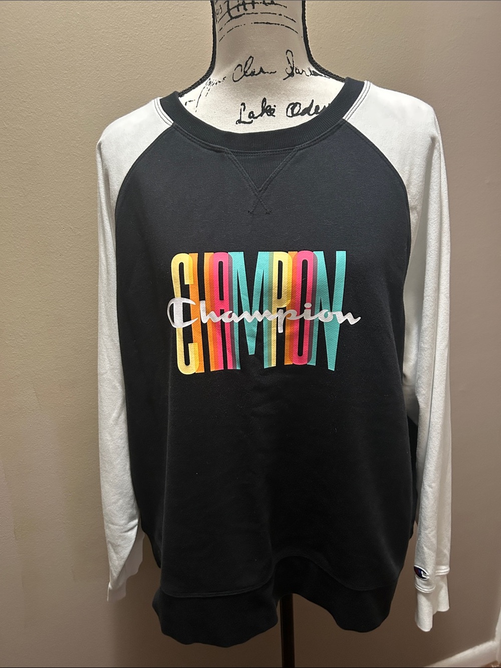 Champion • Multicolor Logo, Black Crewneck. •